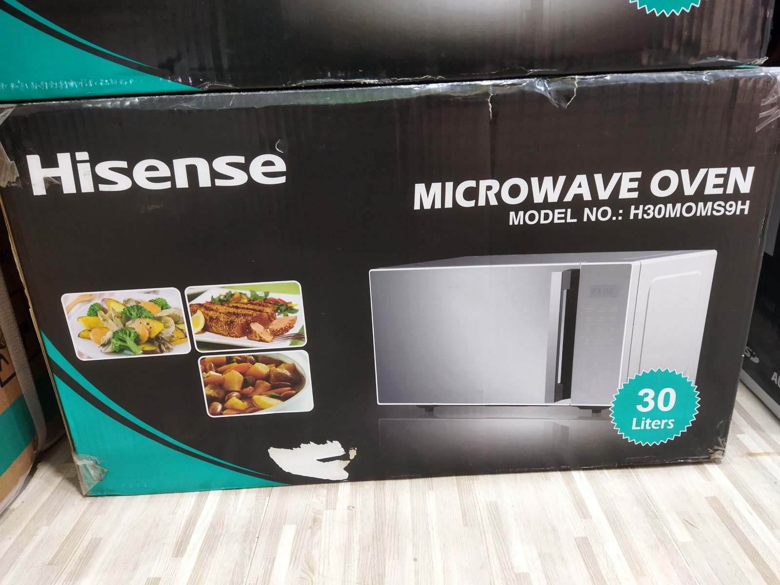 IMG_20220808_151950-scaled-1.jpg Hisense 30L Microwave Oven H25MOMS7HG - Silver - Image 1
