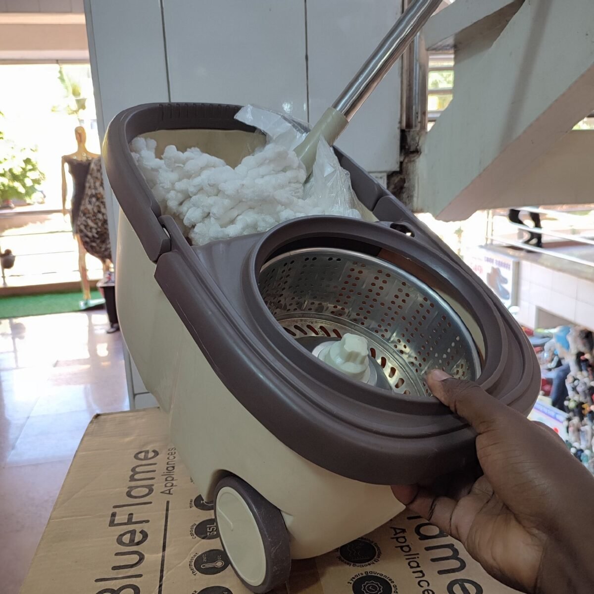 Spin mopper with a pair of mopps and wheels with Free liquid soap 5liters - Image 4