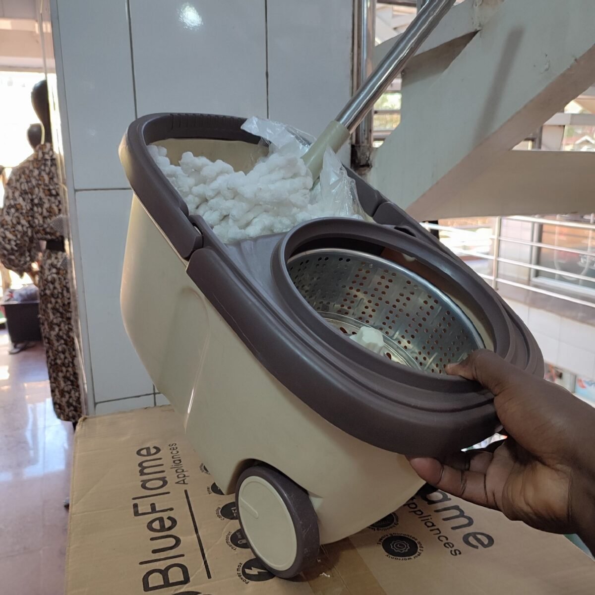 Spin mopper with a pair of mopps and wheels with Free liquid soap 5liters - Image 3