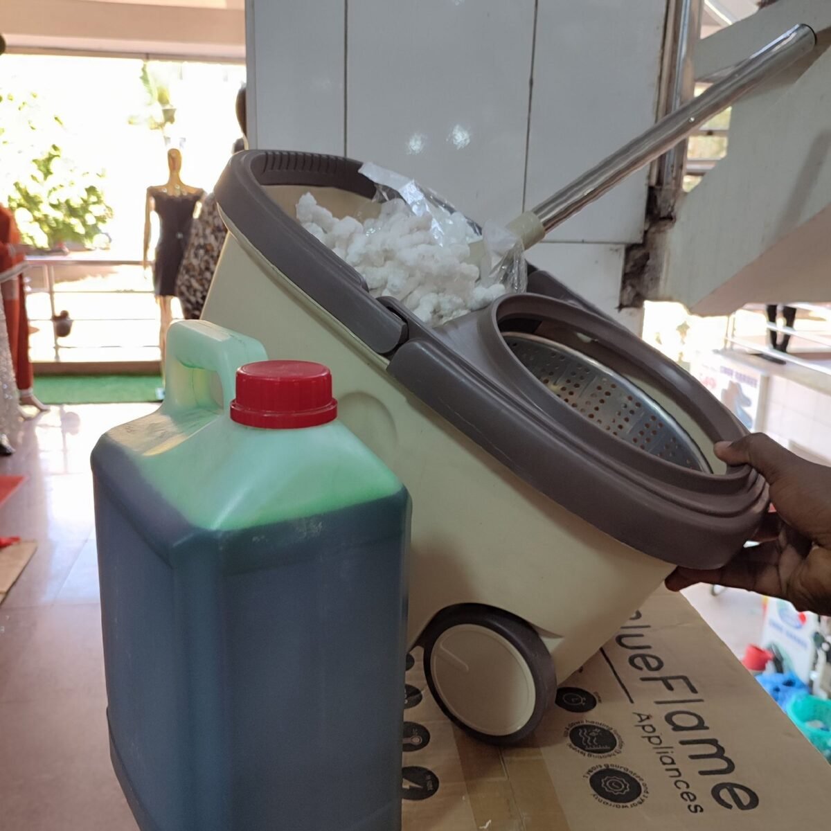 Spin mopper with a pair of mopps and wheels with Free liquid soap 5liters - Image 5