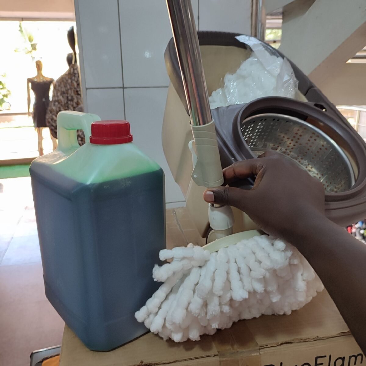 Spin mopper with a pair of mopps and wheels with Free liquid soap 5liters - Image 2