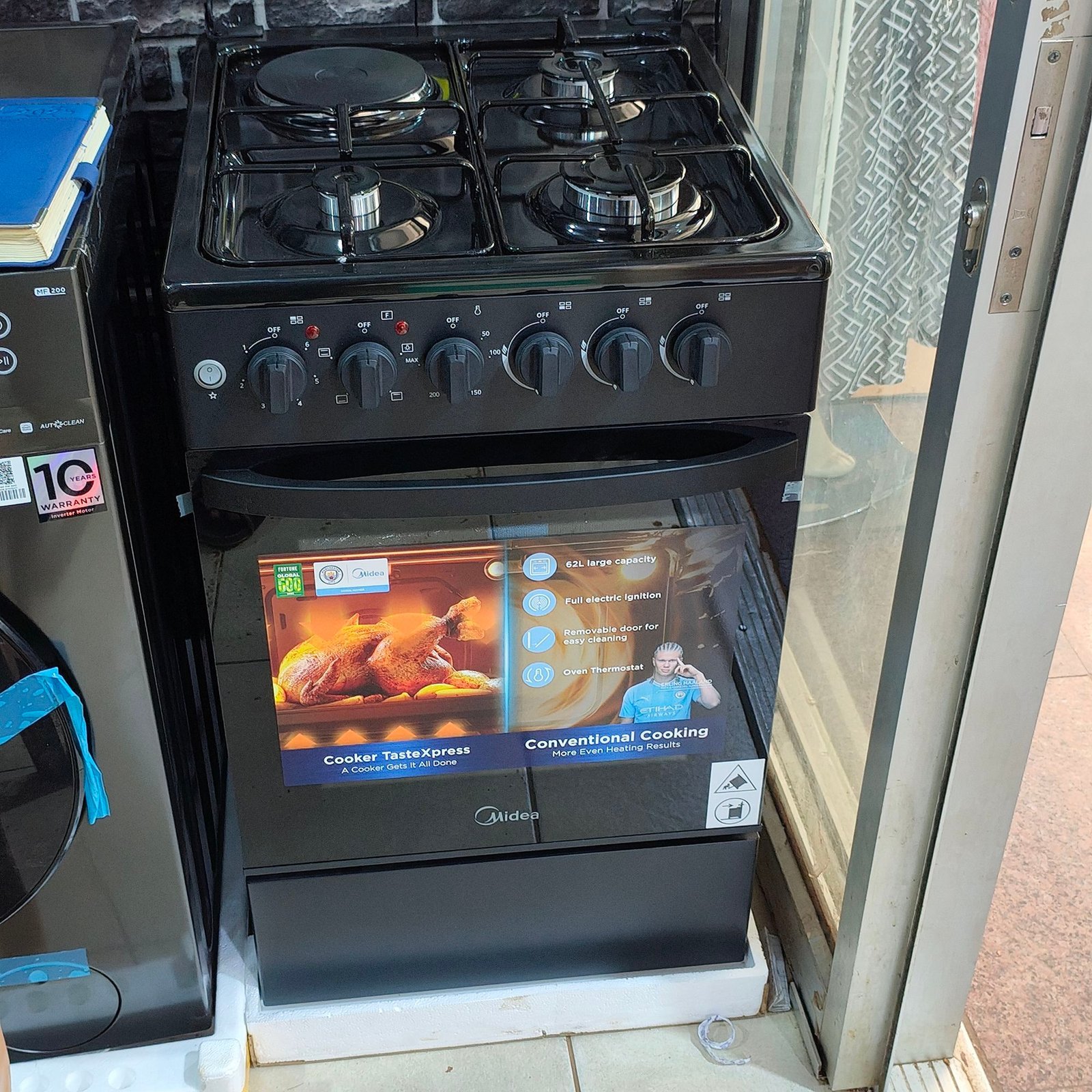 img_20250426_124503275112798151140595.jpg Midea gas electric cooker 3gas 1 electric plate and electric oven 50cm by 60cm with self ignition - Image 1